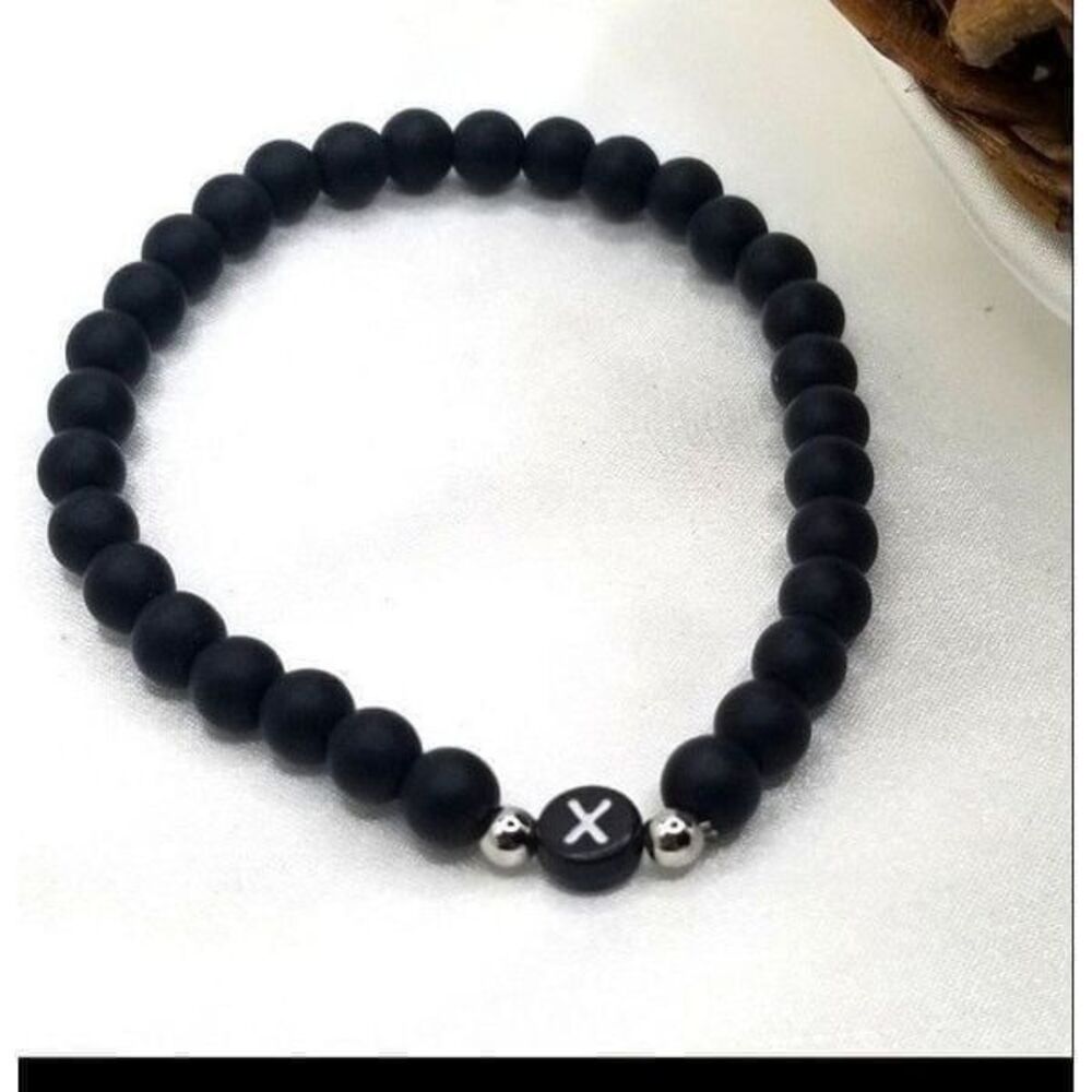 Black beaded stretch elastic cord letter Y bracelet.
